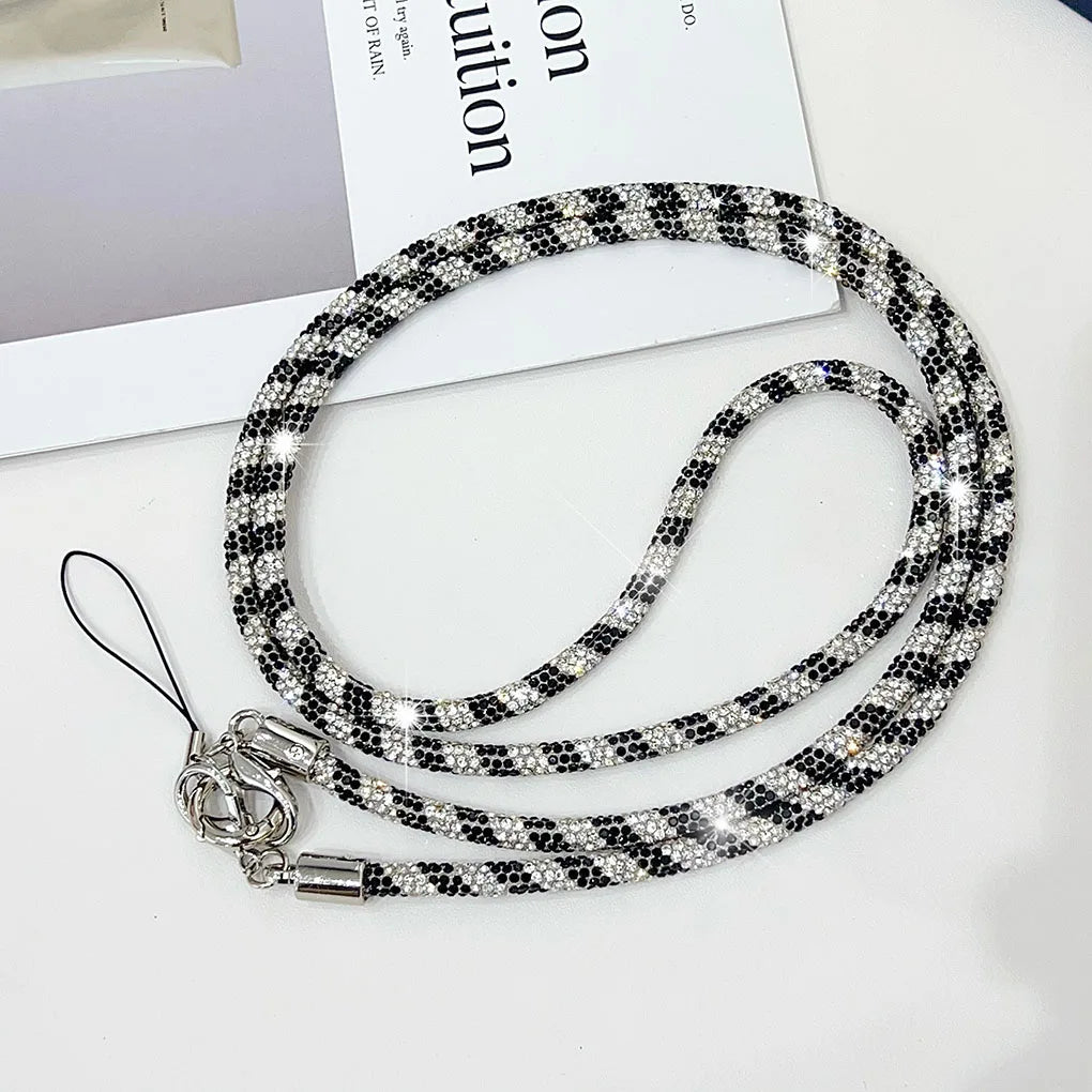 Lanière de téléphone élégante avec strass