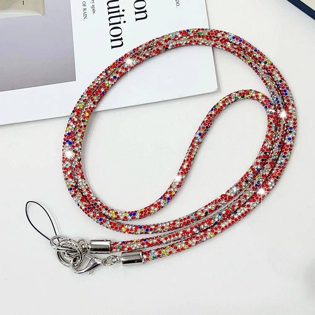 Lanière de téléphone élégante avec strass