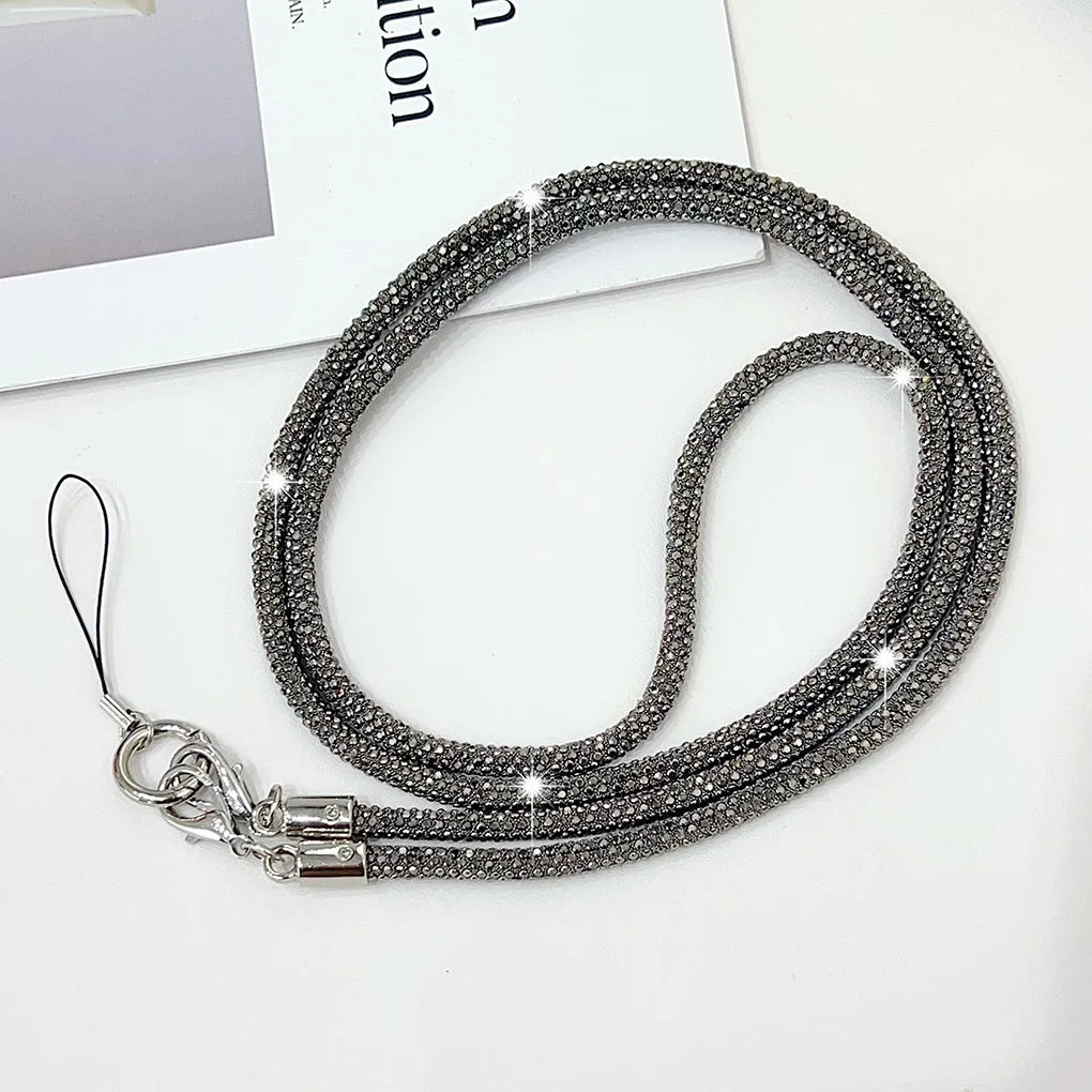 Lanière de téléphone élégante avec strass