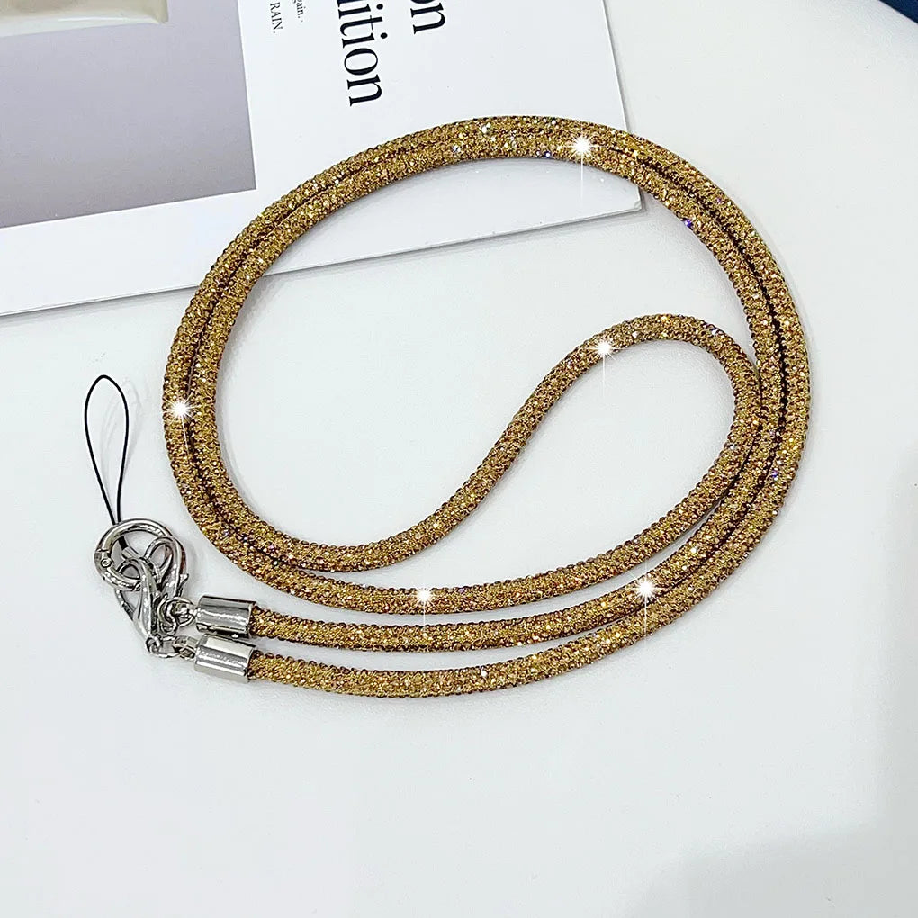 Lanière de téléphone élégante avec strass