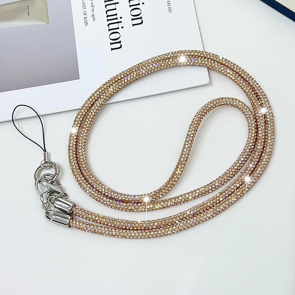 Lanière de téléphone élégante avec strass