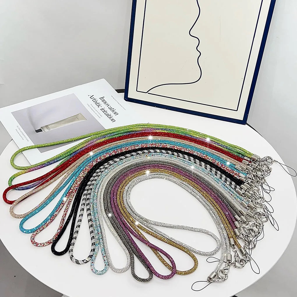 Lanière de téléphone élégante avec strass